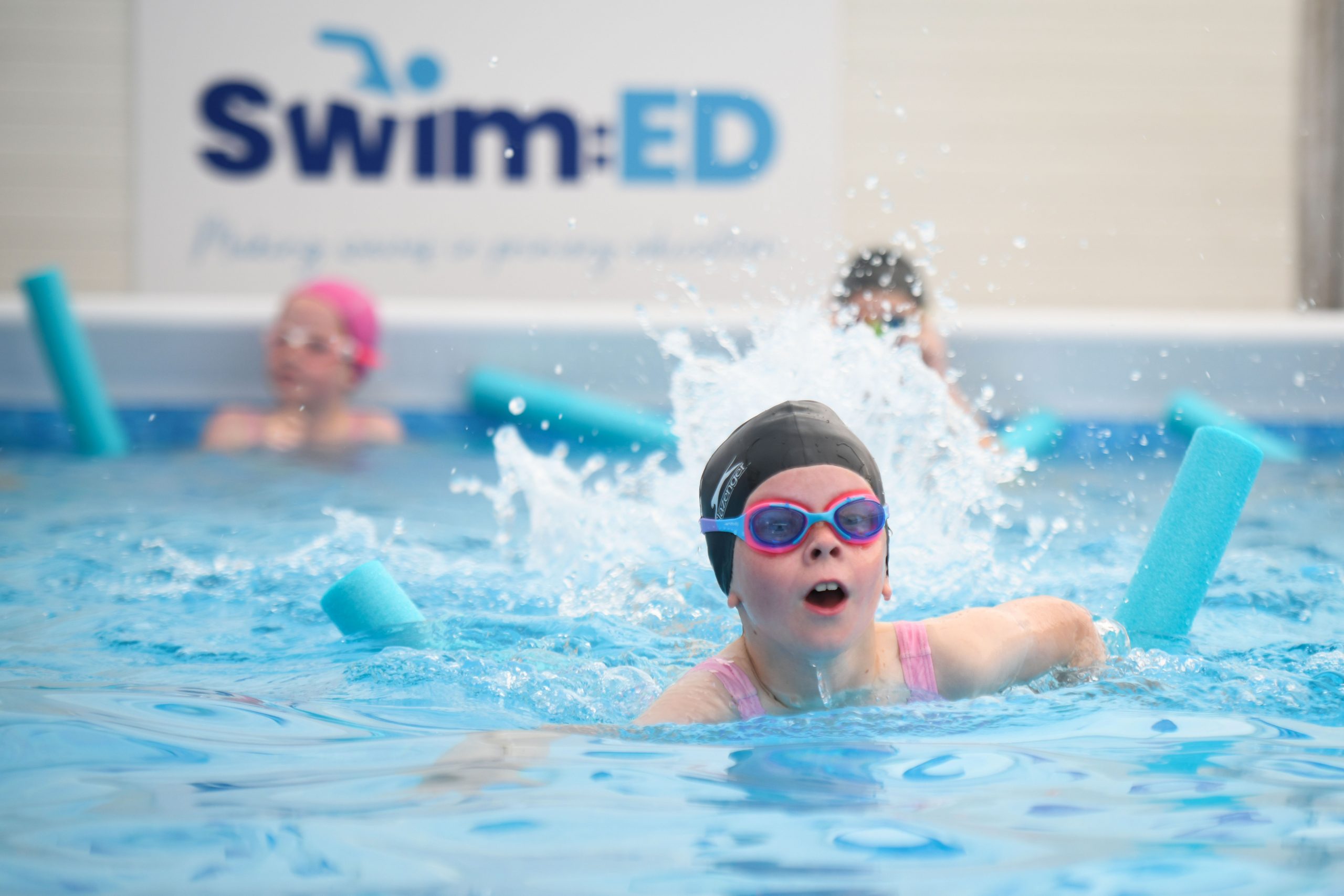 Swim:ED primary school aged girl swimming in a pool